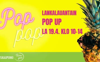 Pop up -teksti ja ananas keltaisella pohjalla.