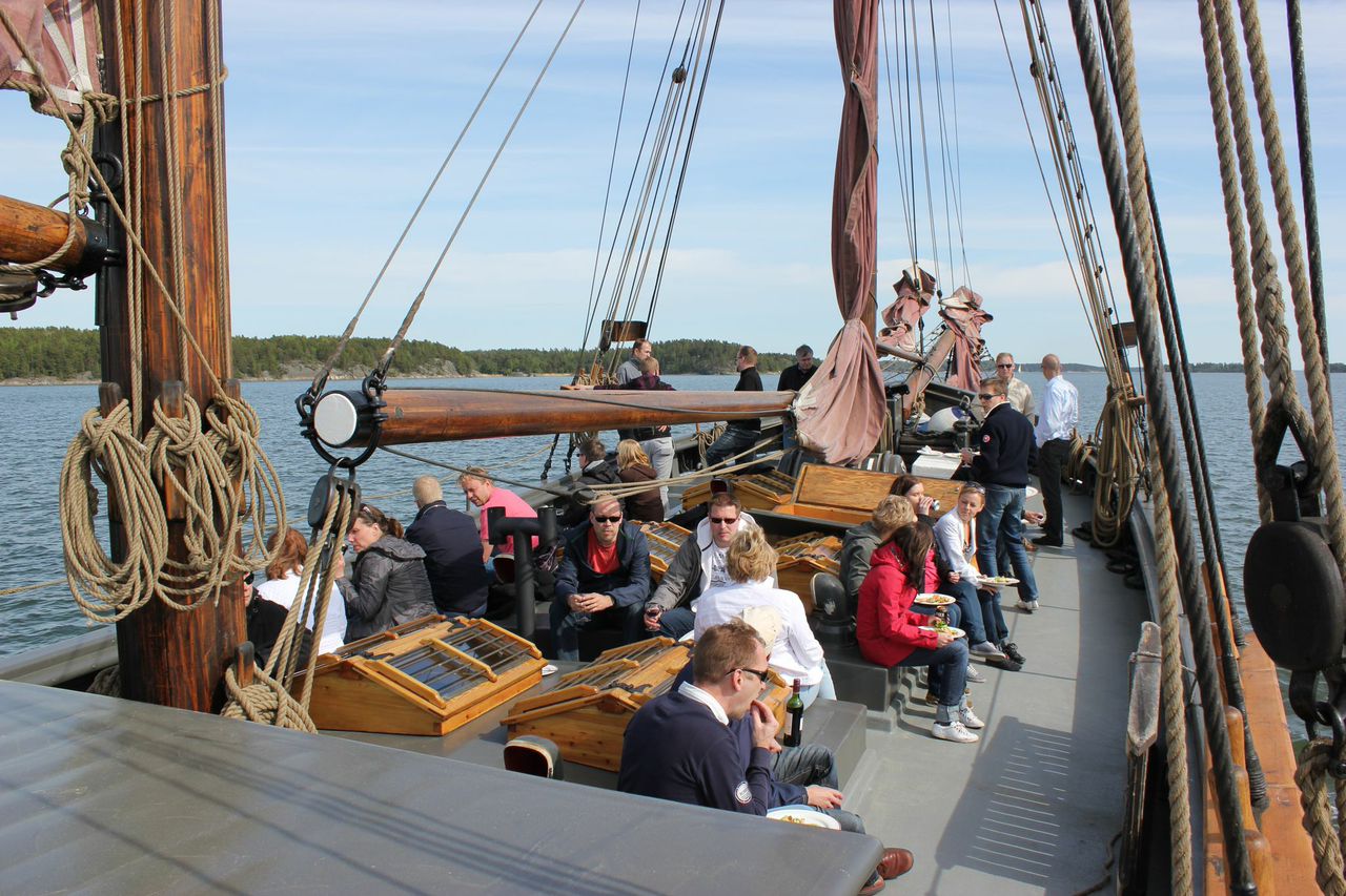 Asiakkaita Olgan kannella